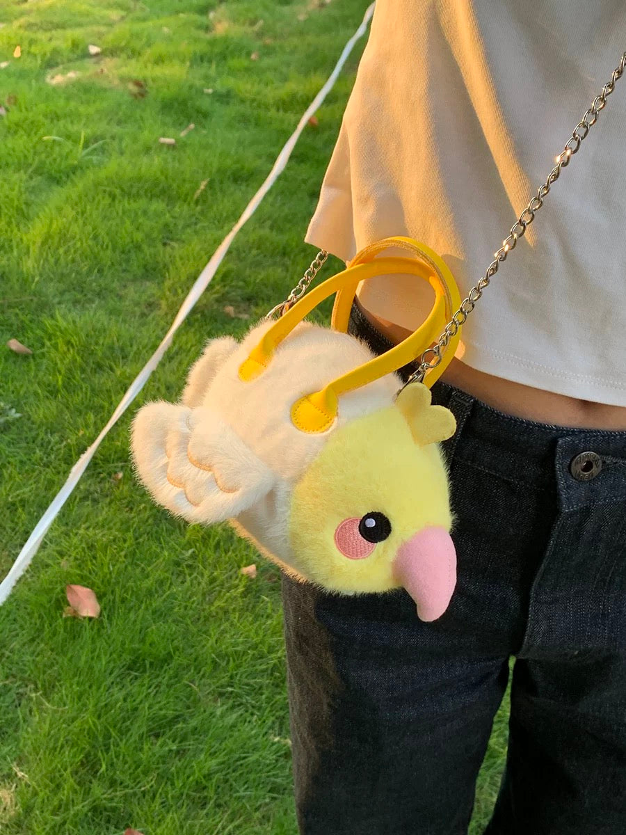 A bag with a variety of bird patterns π