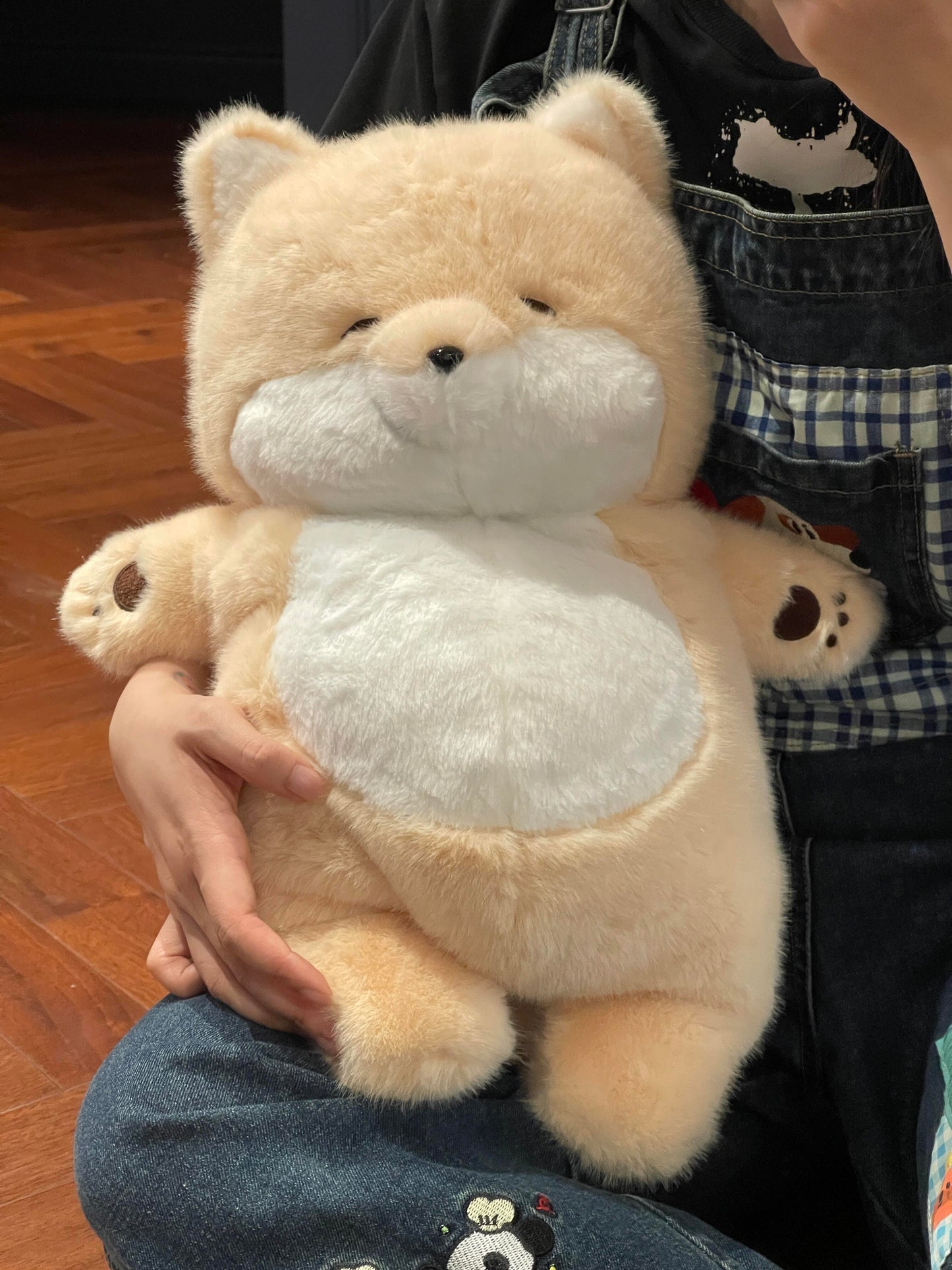 Shiba Inu doll lying flat