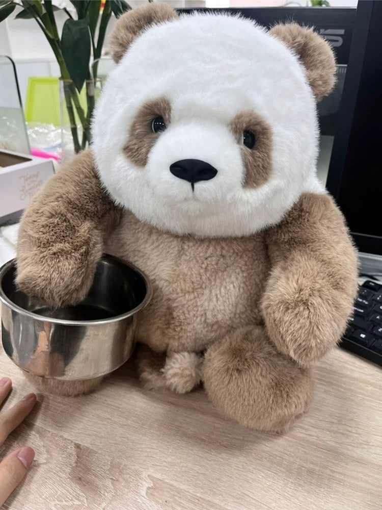 Brown panda🐻❄️🐻