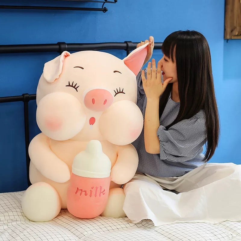 Pig holding a milk bottle🐽🐷
