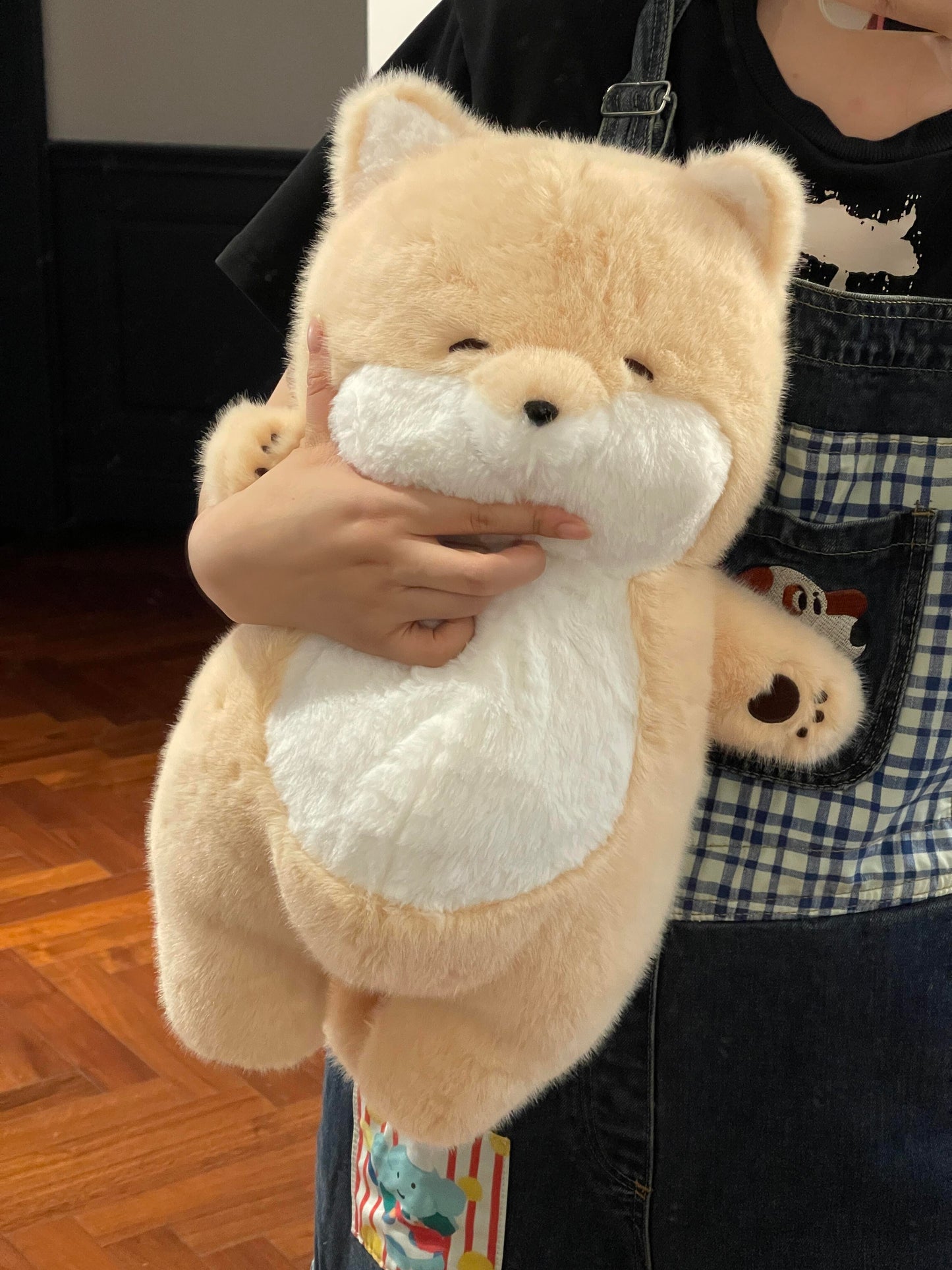 Shiba Inu doll lying flat