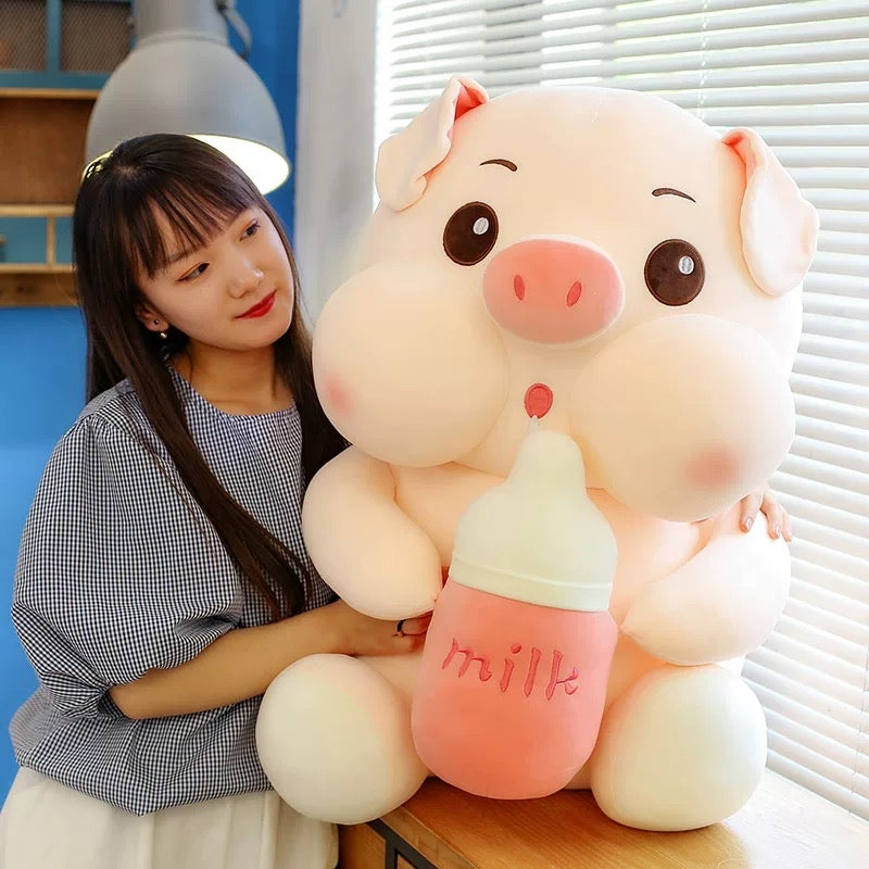 Pig holding a milk bottle🐽🐷