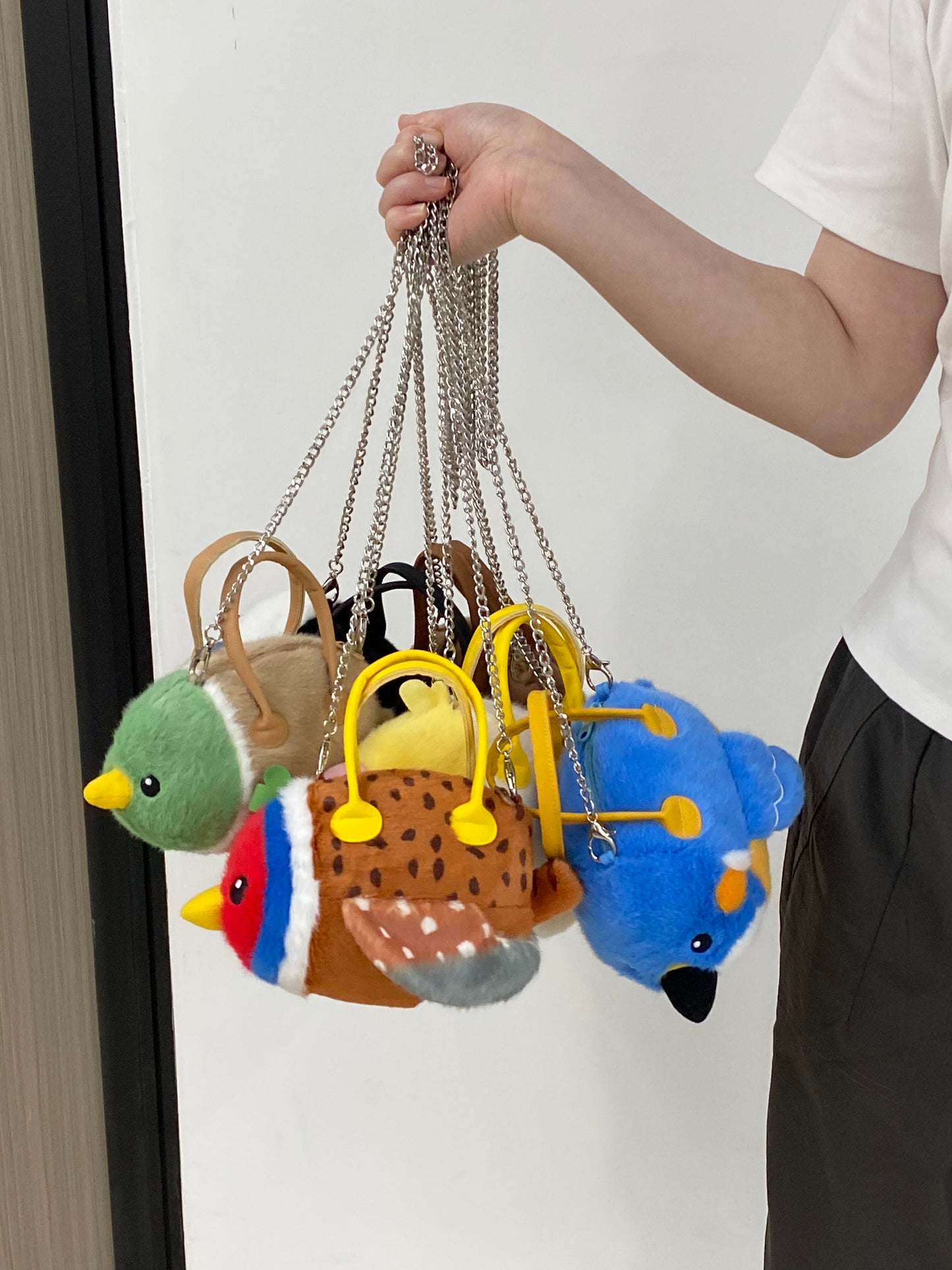 A bag with a variety of bird patterns π