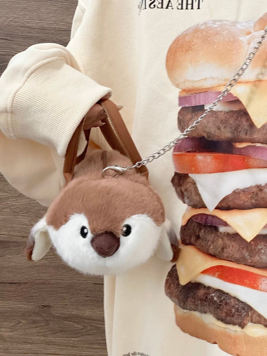 A bag with a variety of bird patterns π
